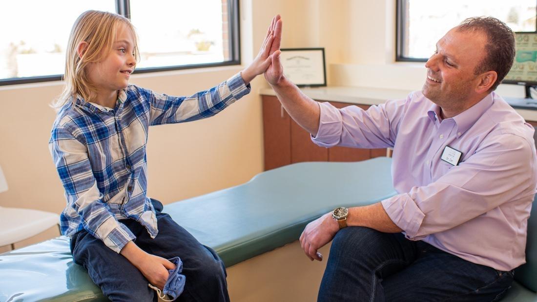 Doctor with Patient highlands ranch pediatric dentist | Dr Sierk with patient