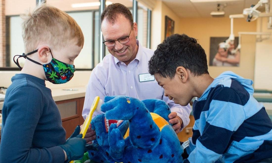 Doctor with Patients Pediatric dentist highlands ranch | Dr Jon with patients
