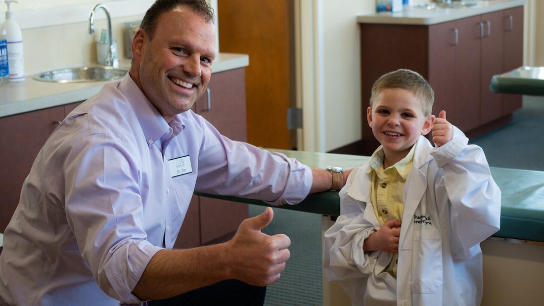 Happy Patient Highlands Ranch Pediatric Dentist | Dr Sierk with young patient