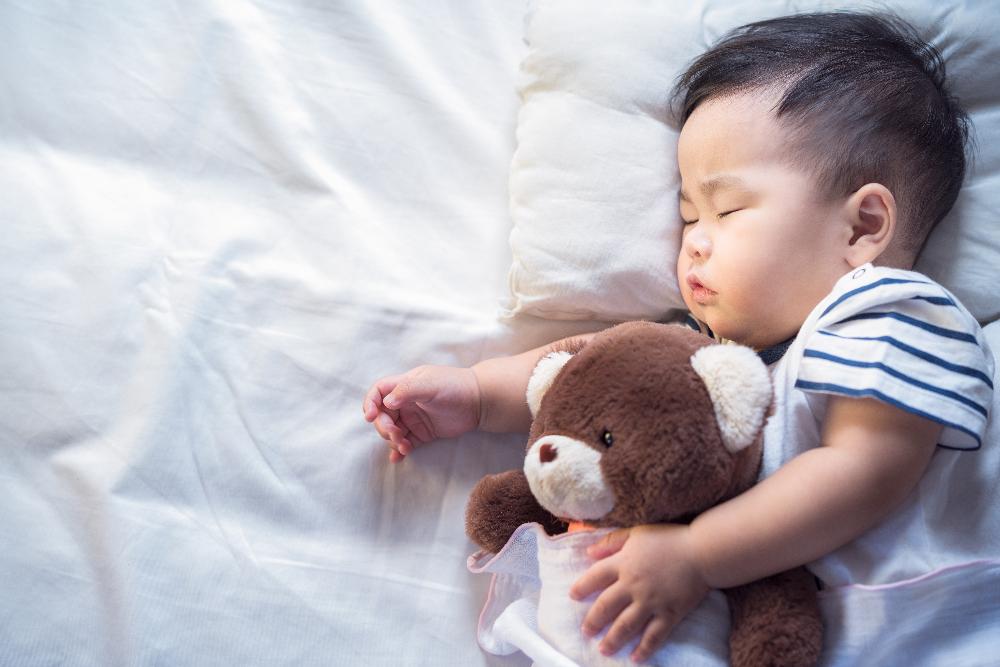 toddler sleeping soundly after myofunctional therapy in Highlands Ranch