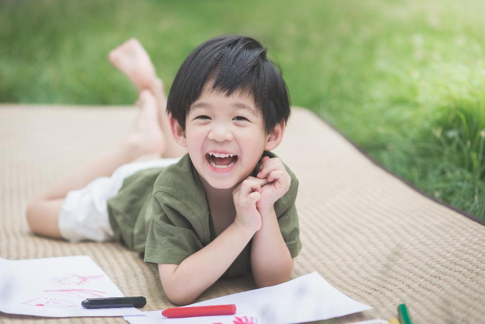 pediatric dentist castle pines | boy smiling
