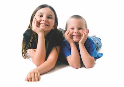 children smiling in highlands ranch