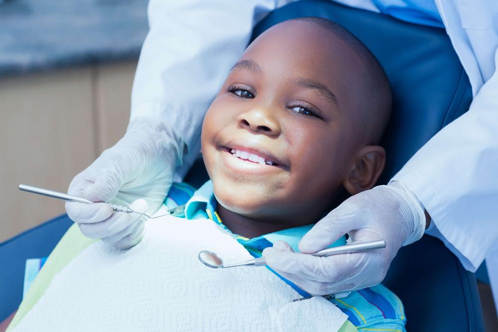 tooth extraction highlands ranch | child in dental chair