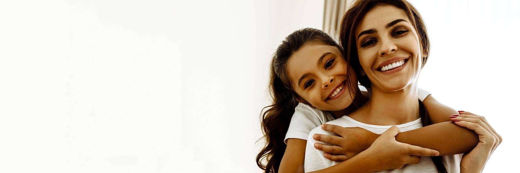 mother and daughter smiling | Pediatric dentist castle rock