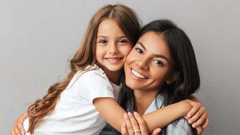 pediatric dentist castle pines | mother with child