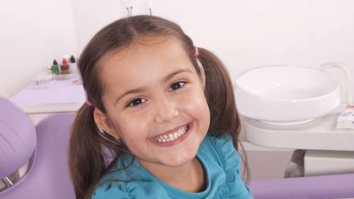 child after frenectomy procedure in castle pines, co