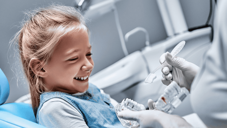 Girl at the dentist | pediatric dentist highlands ranch