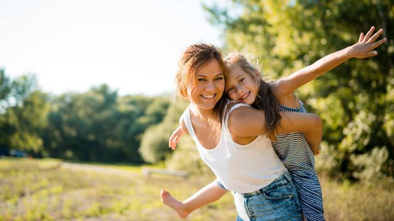 Mother and daughter outdoors | highlands ranch pediatric dentist