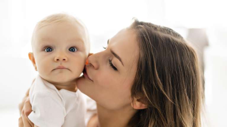 Mother holding baby | Highlands Ranch Pediatric Dentist