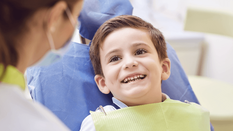 pediatric sedation dentist highlands ranch | child at dentist