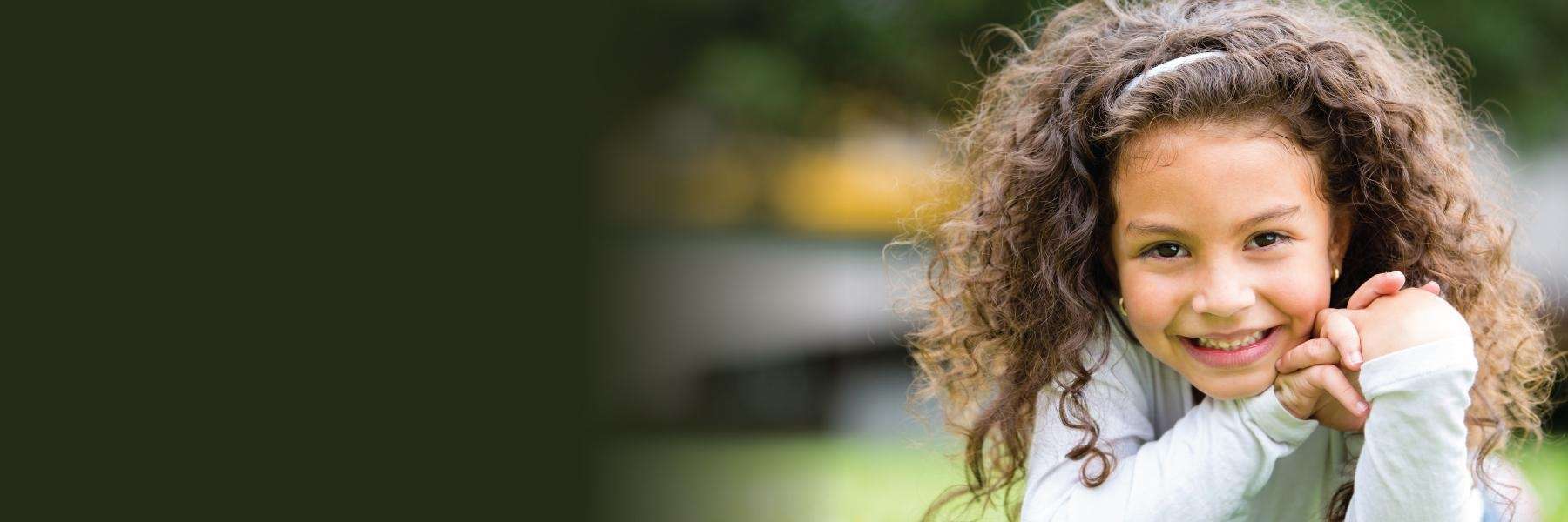 young girl smiling | Castle pines childrens dentist